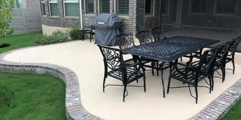 Patio of an Austin, TX home with one of the spray-texture outdoor concrete coatings in patio