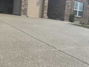Closeup on concrete texture after finishing the resurfacing for one of the driveways in Austin, TX.