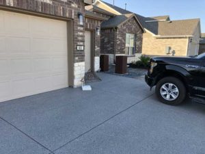 Solid and sturdy concrete driveway resurfacing in a home in Austin, TX.