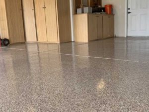 New garage floors with shiny epoxy coating in and Austin, TX house.