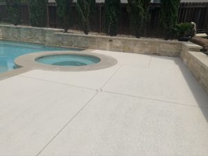 New concrete overlay pool deck installed by Suncoat of Texas serving Austin, TX and nearby areas.