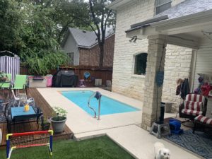 Result of a concrete overlay on a pool deck in an Austin, TX home backyard.