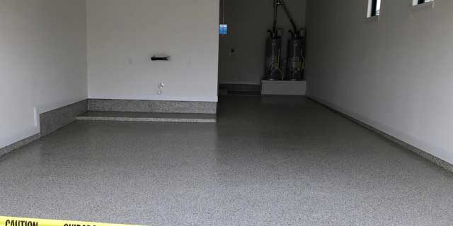An image shows newly installed garage flooring.Get the best garage floor coating in Austin.