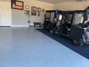 With its new blue epoxy flooring, the garage took on a refreshed and inviting atmosphere.