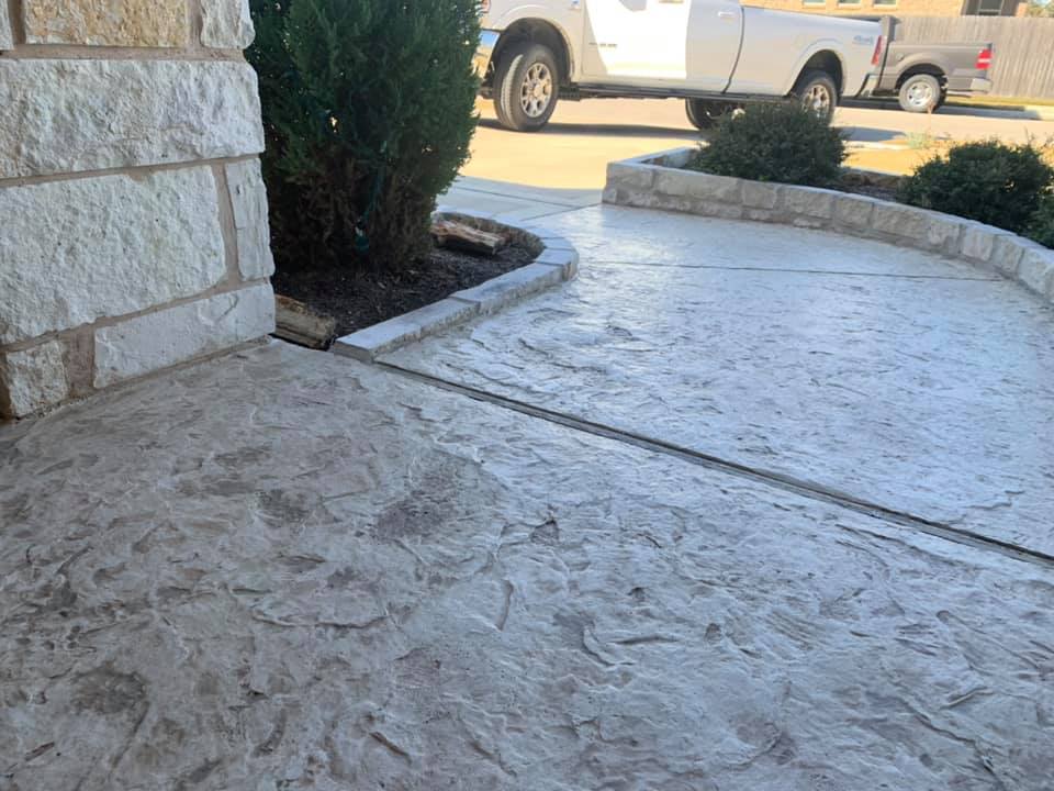 Stamped concrete has the same look as more expensive materials like stone or brick.